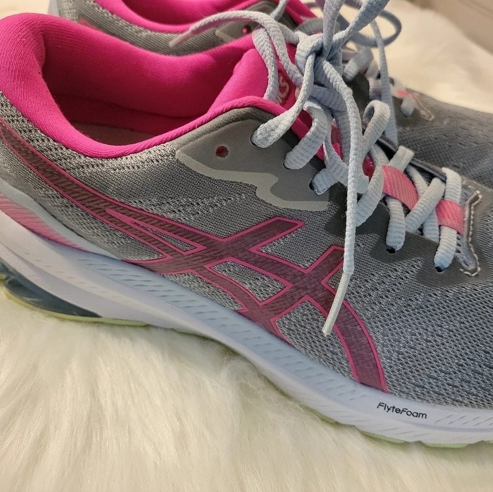 Asics women running featuring